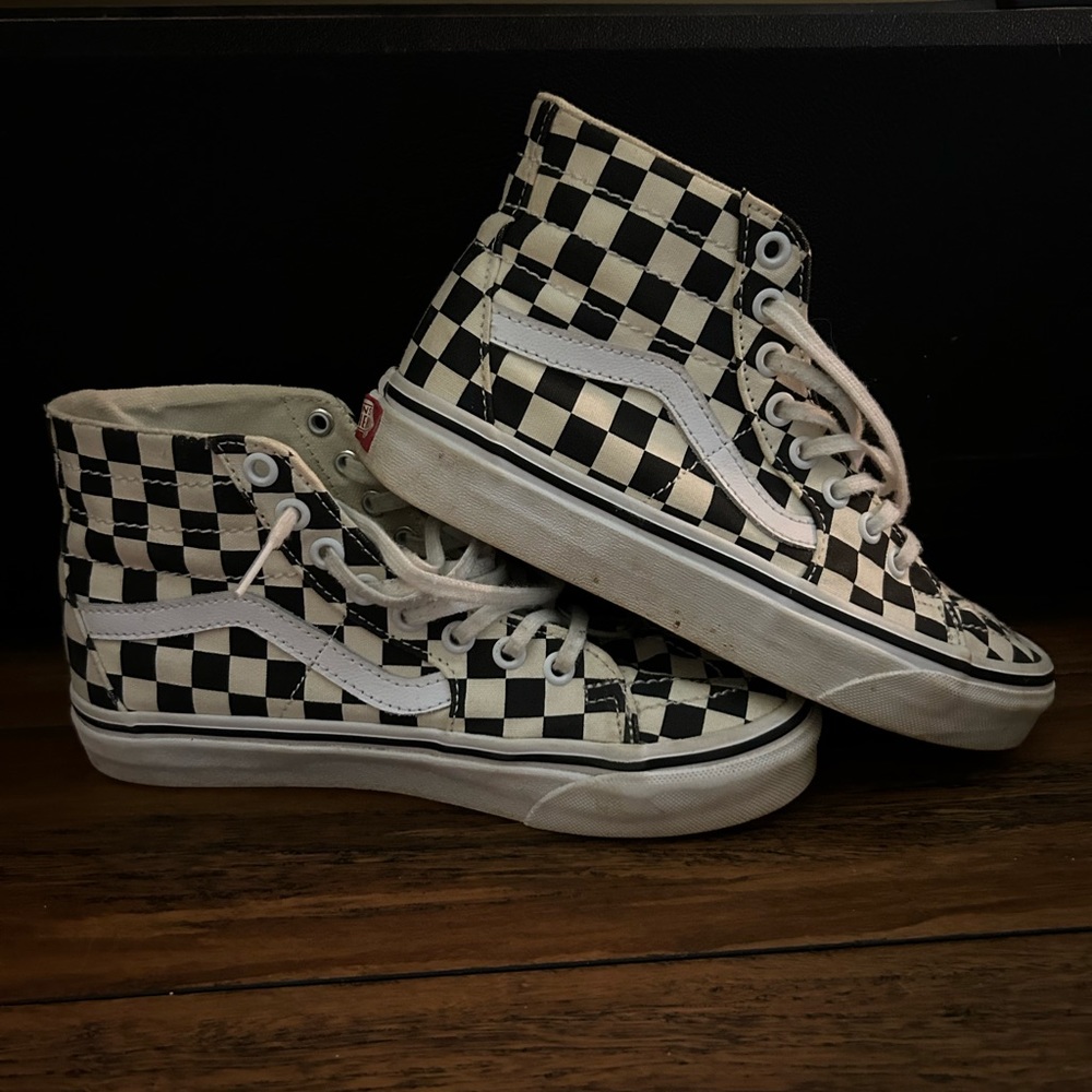 Hi-top checkered vans